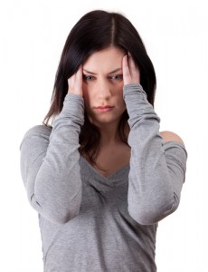 womansufferingfromheadachesandemotionalhealth