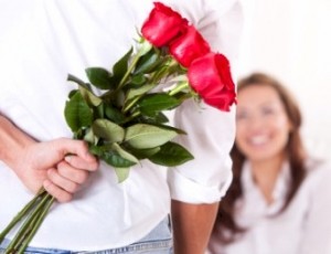 guywhoisholdingflowersforadate