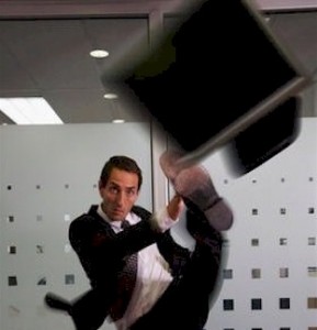 mankickinghisslowcomputer