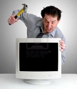 man who is reacting to a slow computer