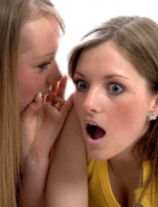 someone who is sharing gossip on facebook