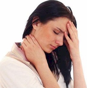 a woman who is feeling severe pain in the head