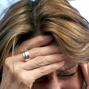 someone who may be suffering from migraine pain